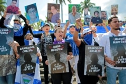 Демонстрация с портретами оппозиционеров и общественных активистов, убитых никарагуанскими спецслужбами и полицией или пропавших без вести, перед визитом в страну Сергея Шойгу. Манагуа, 3 ноября 2019 года