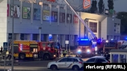 An image shows emergency services working at the scene of a Russian drone attack in Kryvyi Rih.