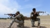 Сотрудники афганских спецслужб занимают позиции во время операции против запрещенной группировки «ИГ» в районе Чапархар, провинция Нангархар. Афганистан, 8 мая 2017 года.