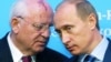 Russian President Vladimir Putin (right) listens to former Soviet President Mikhail Gorbachev during a news conference in Schleswig in northern Germany in December 2004 following a German-Russian summit.