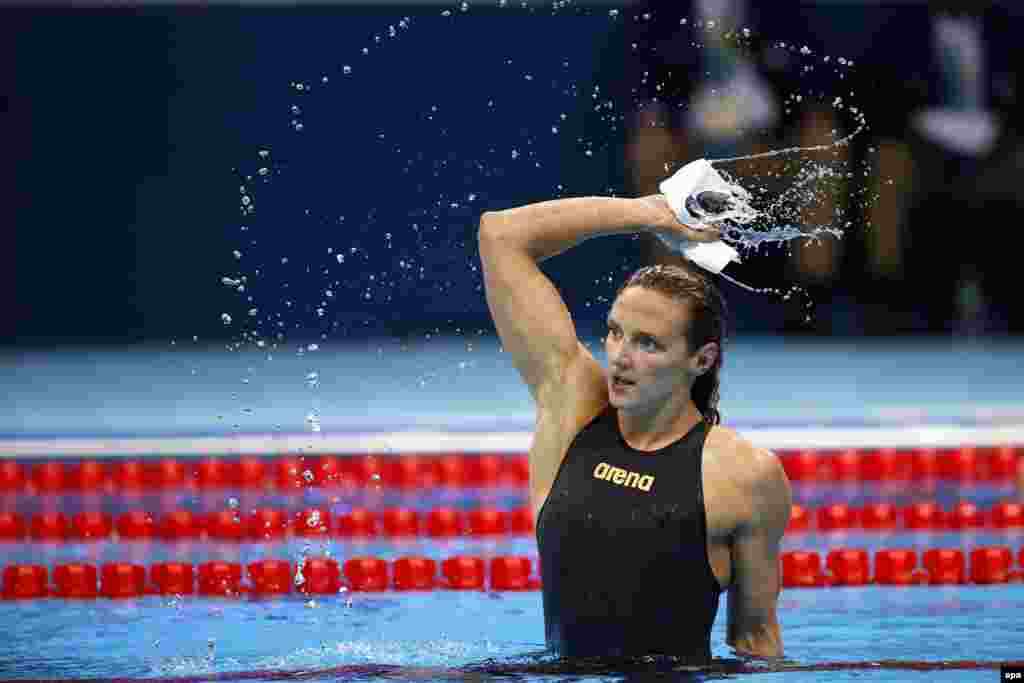 Katinka Hosszu celebrates shattering the world record in the women&#39;s 400-meter individual medley. Her winning time of 4 minutes, 26.36 seconds knocked two seconds off the previous record.&nbsp;