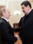Russia -- Russian President Vladimir Putin (L) welcomes Venezuelan President Nicolas Maduro during their meeting at Putin's outside residence in Novo-Ogaryovo, January 15, 2015