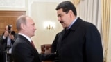 Russian President Vladimir Putin (left) welcomes Venezuela's Nicolas Maduro at Putin's Novo-Ogaryovo residence outside Moscow in 2015.