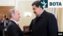 Presidenti rus, Vladimir Putin, dhe Nicolas Maduro nga Venezuela, gjatë një takimi në rezidencën e Putinit në periferi të Moskës më 2015. 