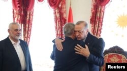 La întânirea dintre președintele Turciei, Recep Tayyip Erdogan, cu liderul Hamas, Ismail Haniyeh, de la Istanbul, a participat și Khaled Meshaal, unul dintre liderii de top ai Hamas.