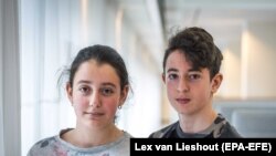 NETHERLANDS -- Two Armenian teens, Howick (right), 13, and Lili, 12, pose in The Hague, August 13, 2018