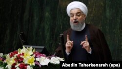 Iranian President Hassan Rohani addresses the parliament in Tehran in August 2017.