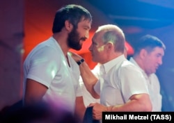 Russian ice hockey player Aleksandr Ovechkin (left) and Russian President Vladimir Putin enjoy a close relationship. They're seen here attending a combat sambo tournament in Sochi in August 2017.