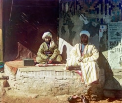 Men posing in central Samarkand.