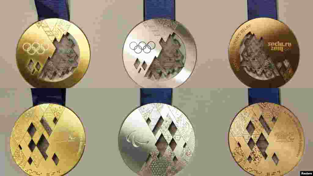 Russia unveiled its medals for the 2014 Winter Olympic Games in Sochi at a presentation in St. Petersburg. (Reuters/Alexander Demianchuk)