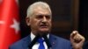 Turkey - Turkish Prime Minister and the leader of Turkey's ruling party, the Justice and Development Party (AK Party) Binali Yildirim delivers a speach during an AK Party's group meeting at the Grand National Assembly of Turkey (TBMM) in Ankara, on Octobe