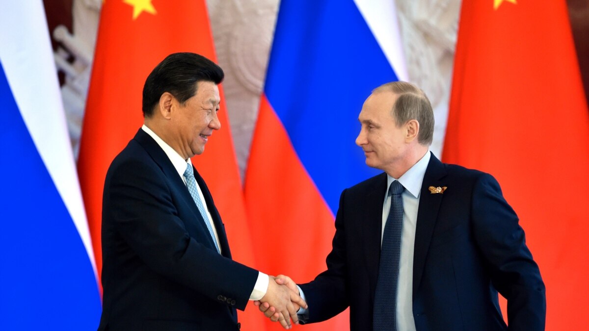 Russia, China Sign Trade Deals To Deepen Ties