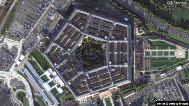 The Pentagon seen on September 15, 2001, after Al-Qaeda hijackers crashed a passenger airliner into the building as part of the September 11 attacks. All 64 people aboard the plane and 125 in the building were killed.The 2026 image of the building, located in Arlington, Virginia, was taken on September 4.