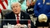 US President Donald Trump speaks to reporters at the Oval Office after meeting US astronauts on April 29. 