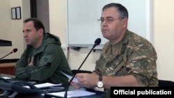 Then-Defense Minister Davit Tonoyan (left) and General Staff chief Artak Davtian in October 2019