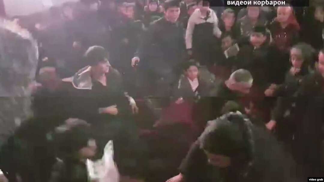 A video recording by a witness shows a group of mostly young men throwing punches at each other, and grabbing and pulling each other’s jackets. 