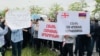 Armenia - Representatives of Armenian brandy firms protest outside the Georgian Embassy in Yerevan, May 13, 2025.