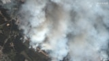 A satellite image shows an overview of the ammunition depot after the explosion, in Toropets