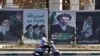 تصاویر رهبران سابق و فعلی جمهوری اسلامی در خیابانی در تهران