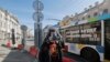 A man wears a protective gas mask in St. Petersburg, where new COVID-19 restrictions are set to be implemented. (file photo)