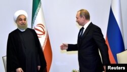 Orsýetiň prezidenti Wladimir Putin we onuň eýranly kärdeşi Hassan Rohani, Baku, 8-nji awgust, 2016