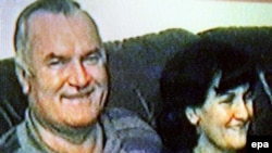 A TV grab reportedly shows war crimes fugitive Ratko Mladic and his wife.