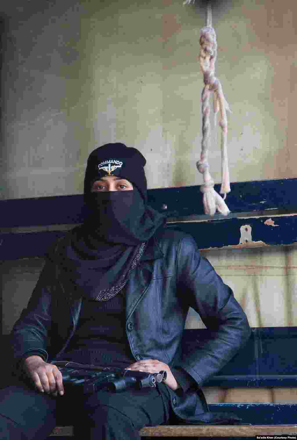 Iram wears a face veil as part of her uniform, but it is not mandatory.