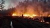 Firefighters try to extinguish wildfires in Yakutia in Siberia. (file photo)