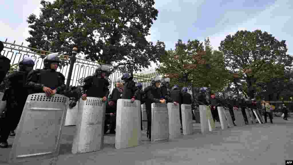 Riot police were also drafted in for the cordon around government headquarters.