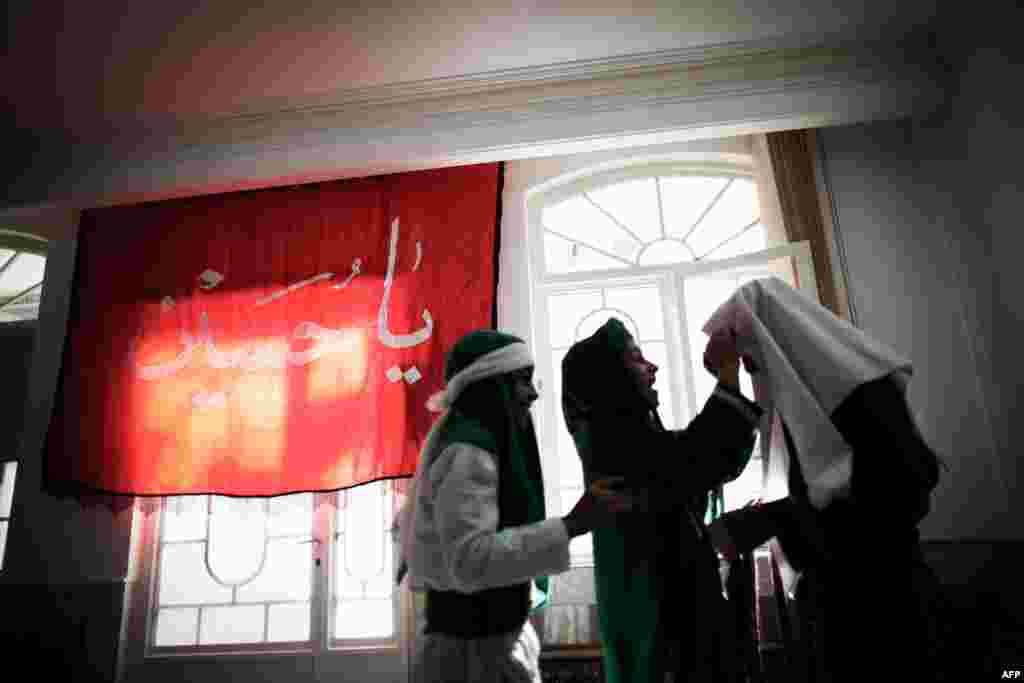 Women prepare for their roles of allies of Prophet Muhammad's grandson, Imam Hussein.