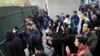 IRAN -- Iranian students clash with riot police during an anti-government protest around the University of Tehran, Iran, 30 December 2017