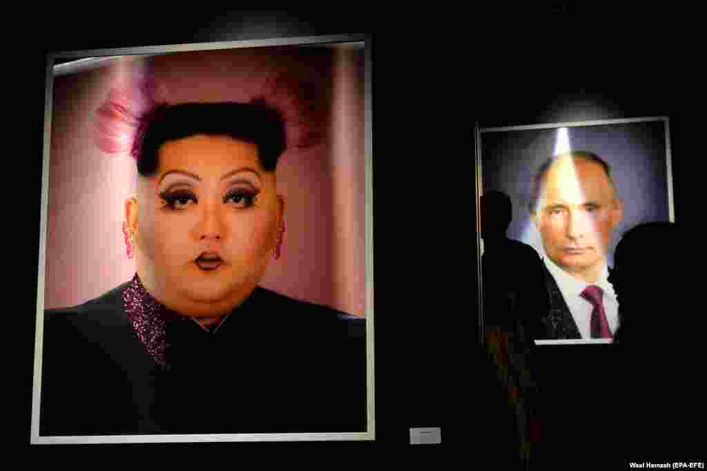 Artwork depicting North Korean leader Kim Jong Un (left) and Russian President Vladimir Putin is displayed at an exhibition called MonuMental by an anonymous artist who goes by the name Saint Hoax at the Dome City Center in Beirut. Saint Hoax is a Syrian artist who depicts political figures and pop culture icons. (EPA-EFE/Wael Hamzeh)