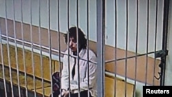 Muškarac identifikovan kao Kalob Byers Wayne, 28, prikazan je iza rešetaka u Moskvi ovog mjeseca.