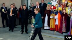 Германи -- Немцойн канцлер Меркел Ангела ког-салазаш хахка яханчехь лазийна, делахь а шен болх ца битина цо, Дечк7, 2014