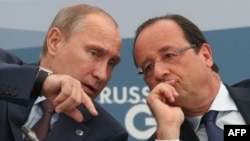 Президент Франції Франсуа Олланд та президент Росії Володимир Путін