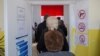 Kosovo - Kosovo Albanians line up to vote for the parliamentary election at a polling station in the northern part of divided city of Mitrovica on October 6, 2019.