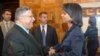 Iraqi President Jalal Talbani (left) shakes hands with Secretary of State Rice during her surprise visit today