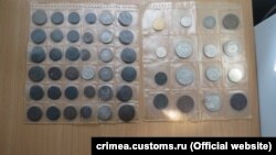 Конфискованные монеты крымской таможней на админгранице Крыма и материковой Украины, январь 2017 год 