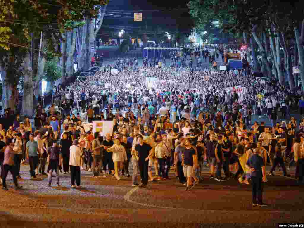 After midnight, protesters left the parliament and marched towards Georgia&rsquo;s ruling Georgia Dream party headquarters, next to Tbilisi&#39;s famous Bridge of Peace.