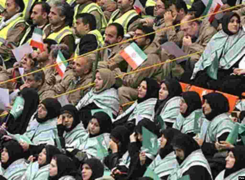 Iran -- men and women sit in segregated sections during a meeting of Basij activists, Tehran, fall 2006