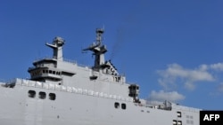 A Mistral class warship ordered by Russia in a French shipyard.