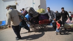 Afghan refugees deported by Iran return to their homeland. 