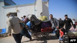 افغانستان - گروهی از افغان‌های بازگشته به کشور