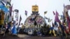 A Donetsk region statue is decorated with flags of Ukrainian units not far from the front line in the direction of Pokrovsk on January 29.