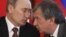 Rosneft President Igor Sechin (right) is a close ally of Russian President Vladimir Putin.