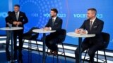 Party leaders Robert Fico (left to right); Michal Simecka, and Peter Pellegrini wait for a televised debate to begin at TV TA3 in Bratislava on September 26.