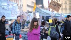 A protester stands on the Puerta del Sol square during a protest against joblessness in Madrid on May 20.