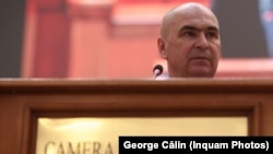Prim-ministrul Ilie Bolojan la asumarea responsabilității de către guvern pentru revizuirea pensiilor magistraților, în decembrie 2025. 