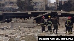 Территория около места взрыва неподалеку от метростанции «Азадлыг проспекти». 13 февраля 2014.