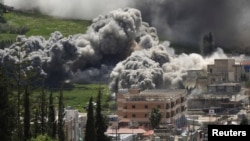 Smoke rises following an Israeli strike in Nabatieh, Lebanon, on April 16.